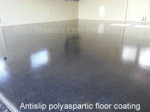 Polyaspartic clear floor coating on polished concrete floor. Antislip finish Polyaspartic clear floor coating on polished concrete floor. Antislip finish