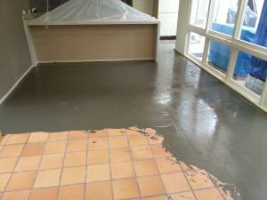 This is an initial skim over a diamond ground tile floor - before being finished with Levelcov