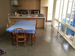 Levelcova floor over older tiles - decorative concrete resurfacing