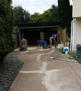 cracked driveway being resurfaced