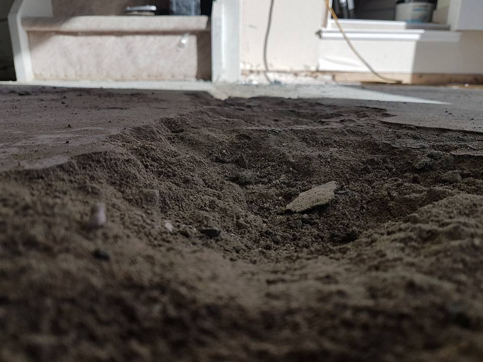 Before levelling this concrete floor