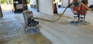 Concrete grinder and vacuum